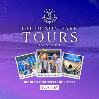 Purple Everton-themed promotional graphic for Goodison Park stadium tours. The Everton crest appears at the top above the large text “GOODISON PARK TOURS.” A faded background image shows the stadium stands. Three small photos in the centre show visitors: one sitting in the dugout, another taking a selfie inside the stadium, and another walking through the players’ tunnel. Beneath the images, text reads “SEE BEHIND THE SCENES OF HISTORY” with a “BOOK NOW” button below.