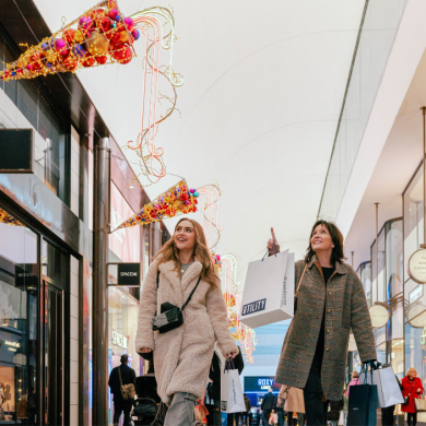 Two women shopping at Christmas