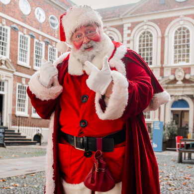Father Christmas stood outside the Bluecoat