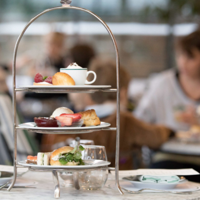 Afternoon tea stand with cakes and scones