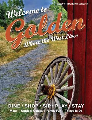 Golden Official Visitors Guide 2025 cover of a wagon wheel against a red barn in the Golden History Park with the title Welcome to Golden Where the West Lives, Dine, Shop, Sip, Play, Stay