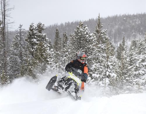 Snowmobiling in the Snowy Range with fresh powder, Albany Lodge rentals