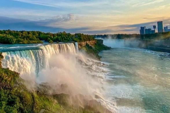 Niagara Falls Niagara Falls at sunset on a family-friendly getaway to Greater Niagara, NY