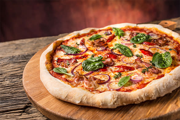 Pizza with basil