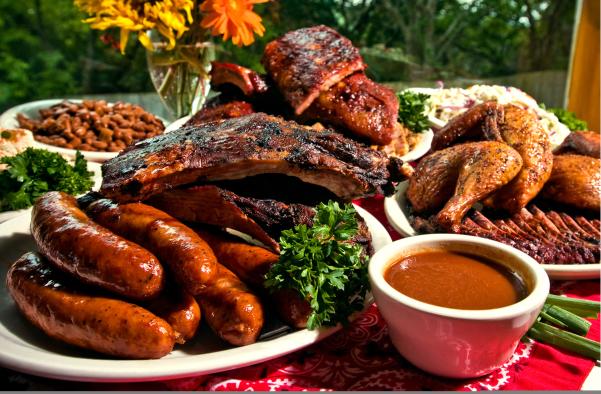 platters of BBQ at The County Line barbecue in austin texas