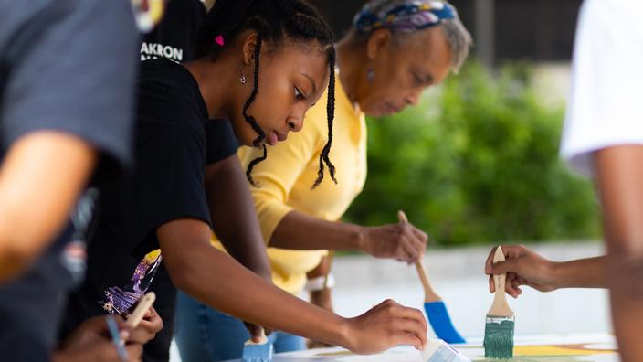 African cultural performance at a festival in Akron