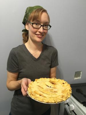 Grape pie contest winner Meghanne Freivald holds a grape pie