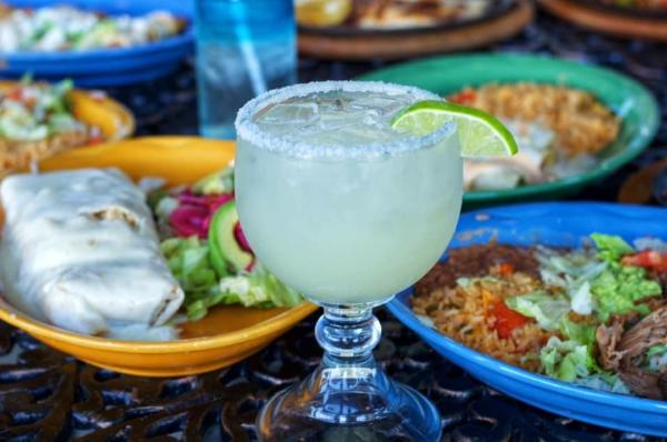 Several dishes and a margarita from Viva Mas