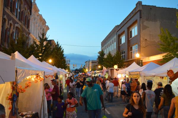 booths line the street at Harvest Homecoming