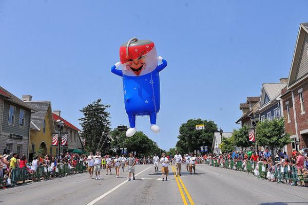 Red, white and blue firecracker parade inflatable in Dublin, Ohio 4th of July Parade