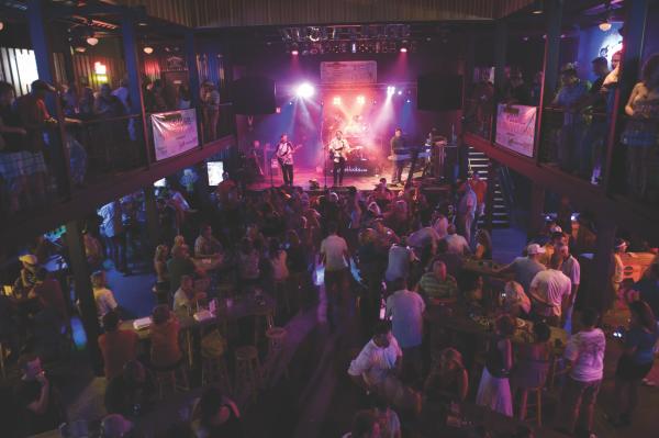 A crowd watches a show at the The Sound Room in Fort Smith.