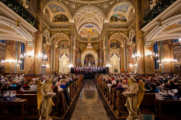 interior of a traditional catholic basilica during christmas celebrations