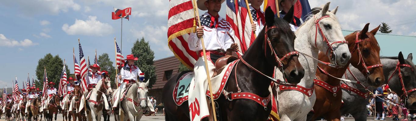 Horses and flags at 4th of July Parade