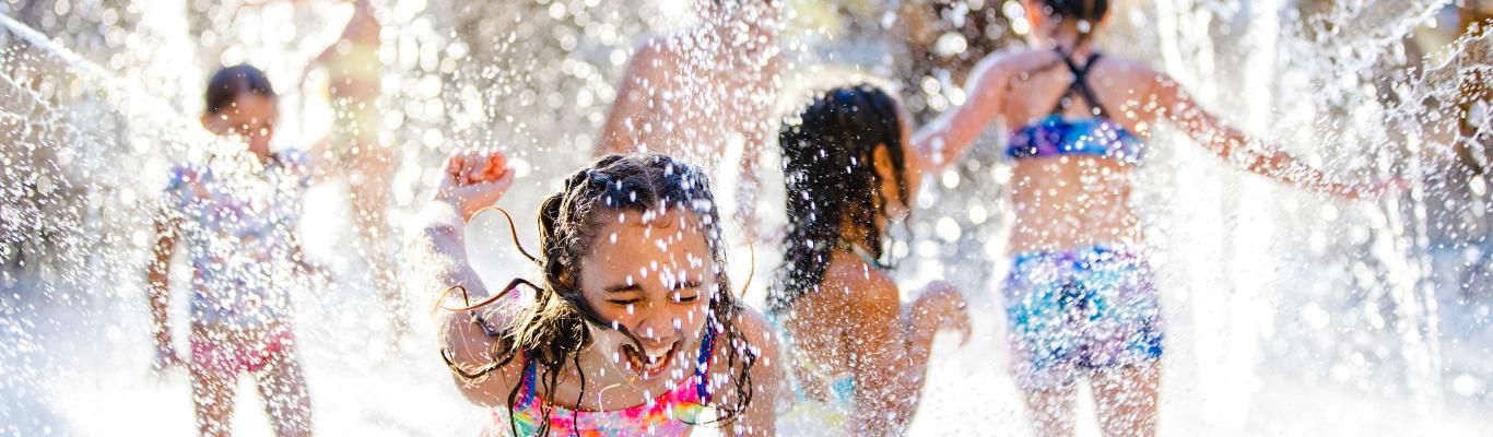 Children play in a splash pad at Hyatt Regency Indian Wells Resort & Spa.