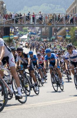 Cyclists Racing Down Main Street