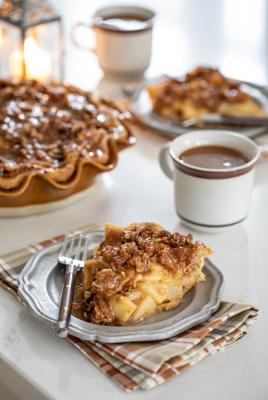 Slice of Pie with whole pie in the background