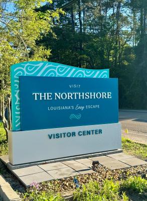 Visit The Northshore Visitor Center monument sign