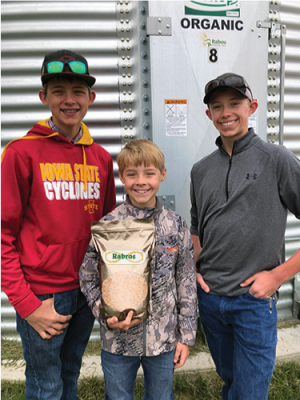 Three brothers, from Rabou Farms display their wheat product from Rabros.