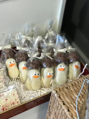 White chocolate covered nutter butter snowman cookies
