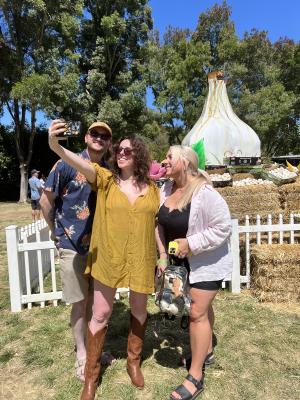 Three people taking a selfie at the Gilroy Garlic Festival