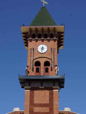would be train robbers emerging from clock tower