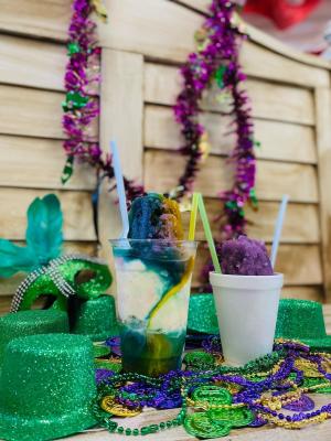 king cake stuffed snoball with bluebell ice cream and cake batter