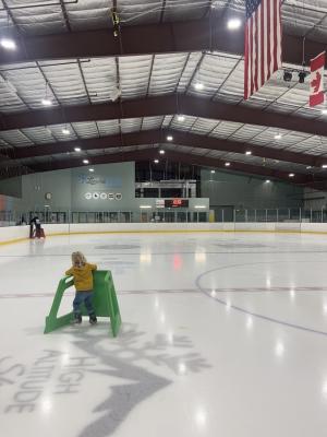 people iceskating indoor ice rink