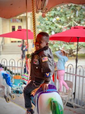 Boy on carousel