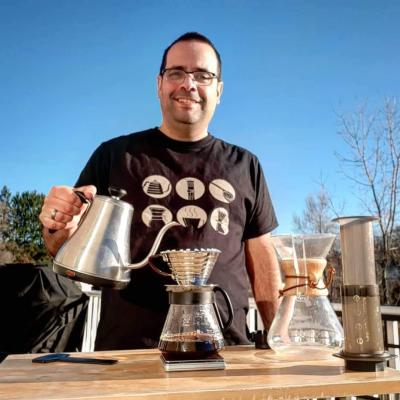 Aaron Cruz Outdoors creating a pour-over coffee