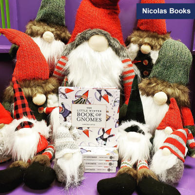 Nicolas Books stuffed Santa book display