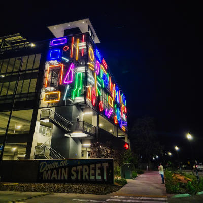 “Interactive Neon Mural #16,” by internationally recognized artist Spidertag, curated by Justkids, and courtesy of OZ Art NWA