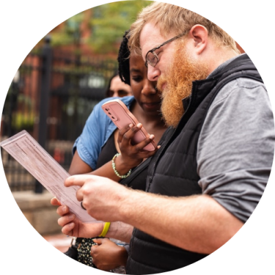 Man and woman reviewing itinerary during Columbus Food Adventures tour