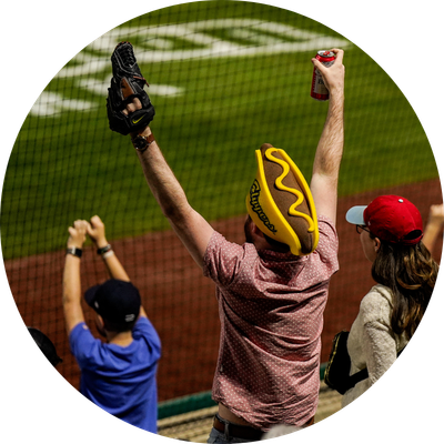 Man cheering for Columbus Clippers during a game