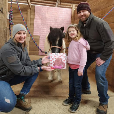 a family with a pony at carriage hill metropark