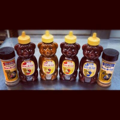 Knackie's BBQ sauces in their trademark Honey Bear container
