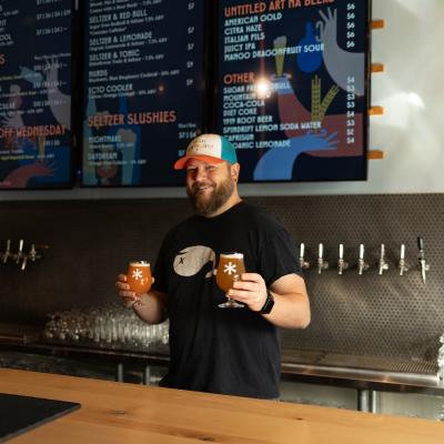 Thesis Beer Project bartender holding beer