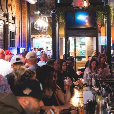 crowd of people in bar