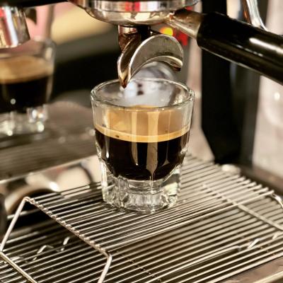 shot of espresso under espresso machine