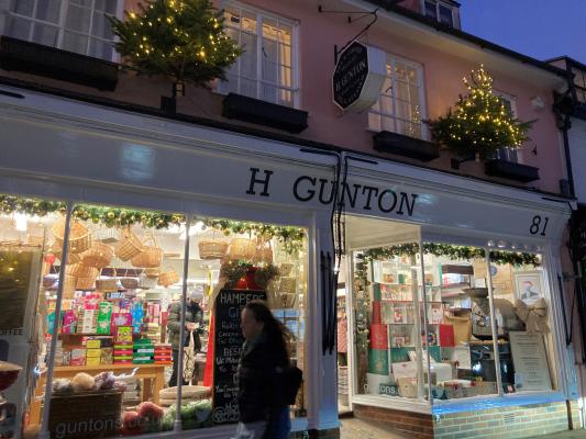 Image shows fronting of Gunton shop at Christmas time