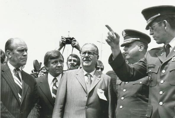 Vice President Ford (Left), US Congressman Elmer "Bud" Shuster, and US Senate Minority Leader Hugh Scott (Center) standing with Maj. Gen. Richard Groves and Col. Robert McGarry (pointing) (USACE Official Photo)