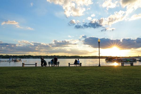 People relaxing on Cedar Lake