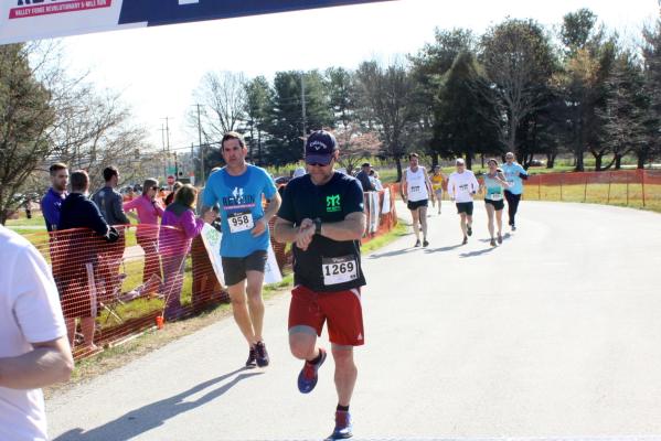Doug Lacey crosses the finish line in the 2016 Valley Forge Revolutionary 5-Mile Run