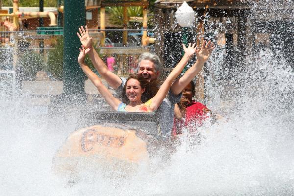 People ride the log ride at Cliff's Amusement Park