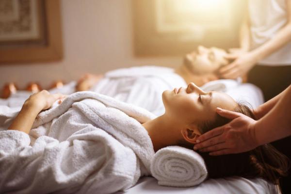 Photo of two people getting a massage at Sanford House Inn and Spa