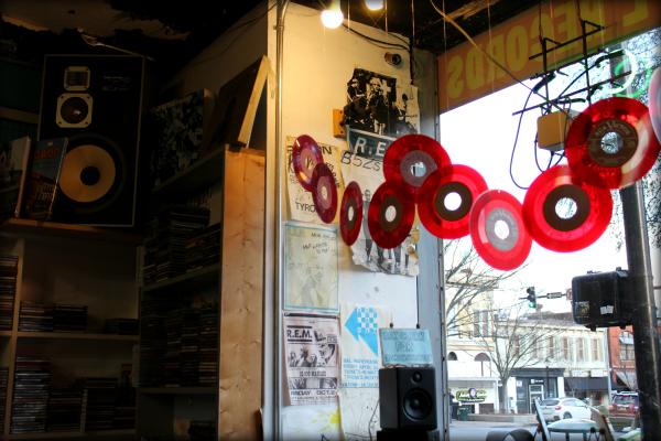 Interior view of records decorating the storefront window of Wuxtry Records in Athens, GA.