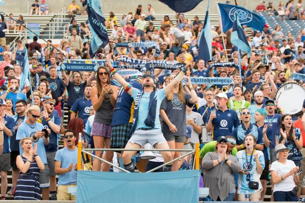 fans in the stands cheer on chattanooga football club at soccer game