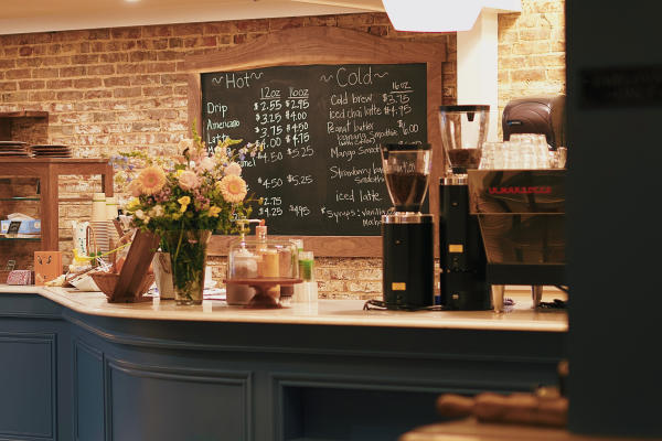 Cultivated Table & Sip House pick up counter and menu
