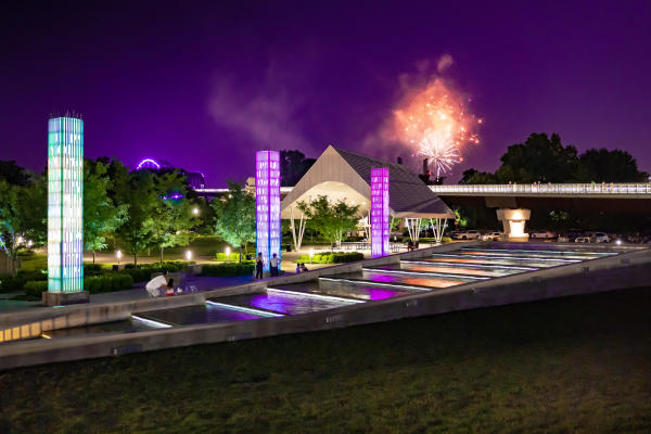 Art installations and fireworks in the night sky at Big Four Station Park in Jeffersonville