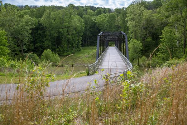 An old iron bridge at Charlestown State Park now makes a great footpath for visitors.