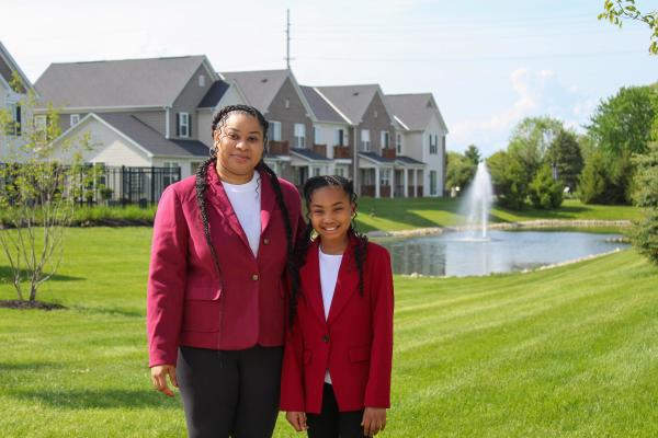 A&K Memories Owner with her daughter outside.